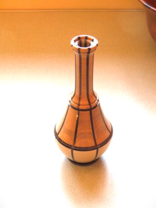 This segmented bud vase won a turning of the month certicate for Ken Akrill